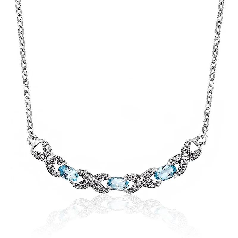 bohemian pendant necklace -Dolce Giavonna Sterling Silver Blue Topaz and Diamond Accent XO Necklace