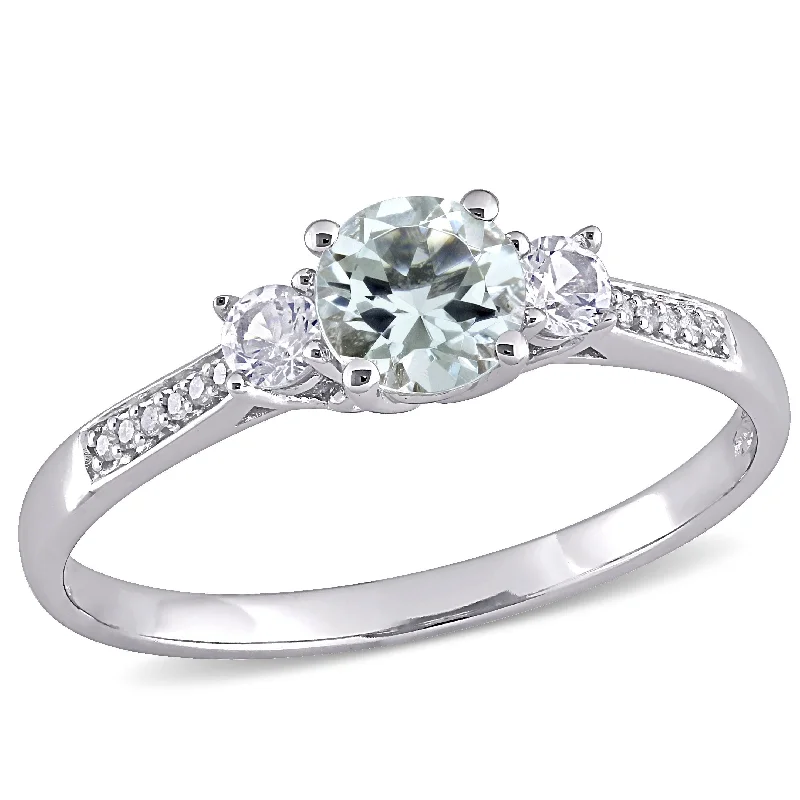 wedding bands for women with emerald and sapphire stones-Miadora 10k White Gold Aquamarine Created White Sapphire and Diamond 3-Stone Engagement Ring