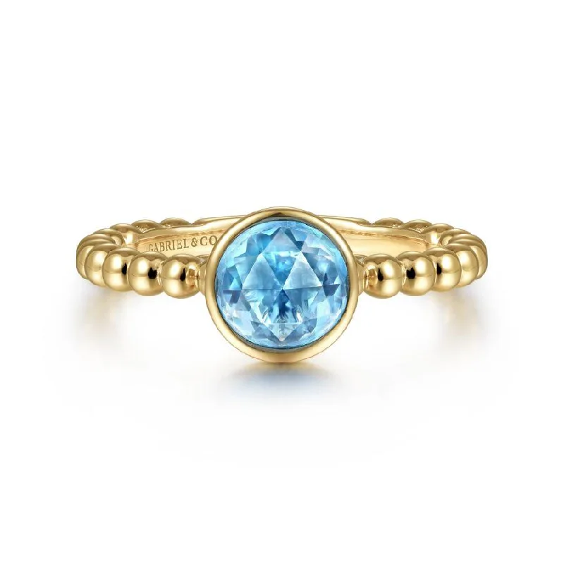 women’s wedding rings with intricate designs-14K Yellow Gold Round Blue Topaz Bezel Set Ring with Bead Shank